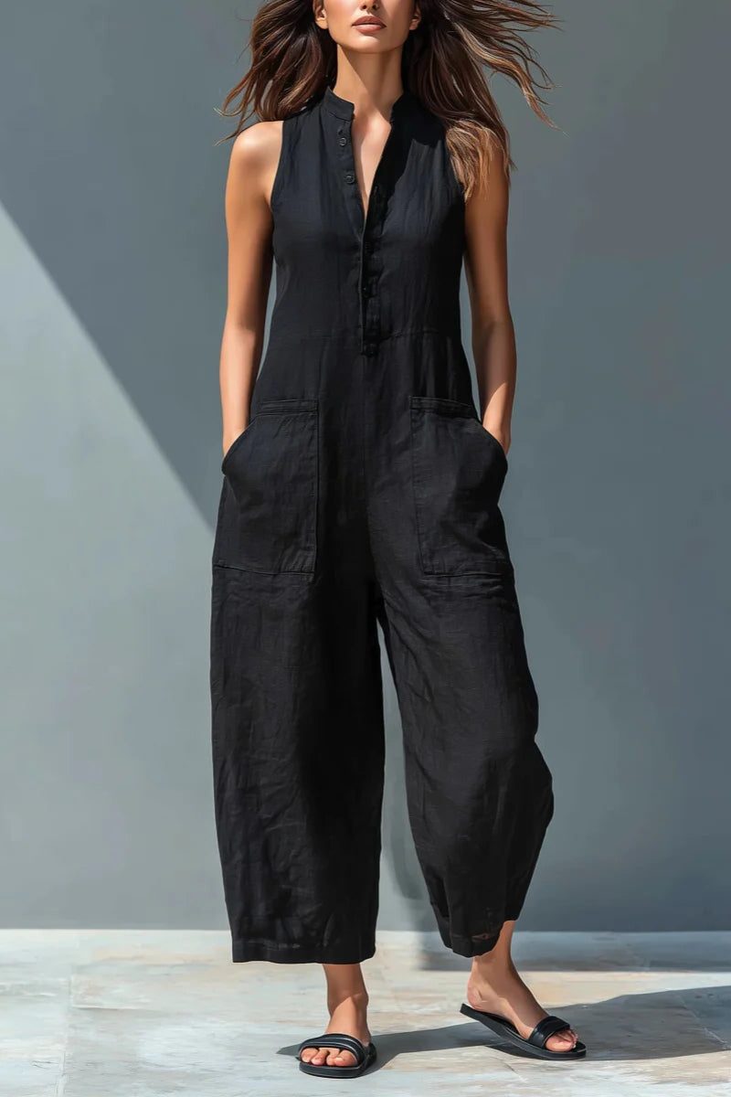 Elegant women's sleeveless jumpsuit featuring a stand collar, wide leg, & comfortable relaxed fit for summer.