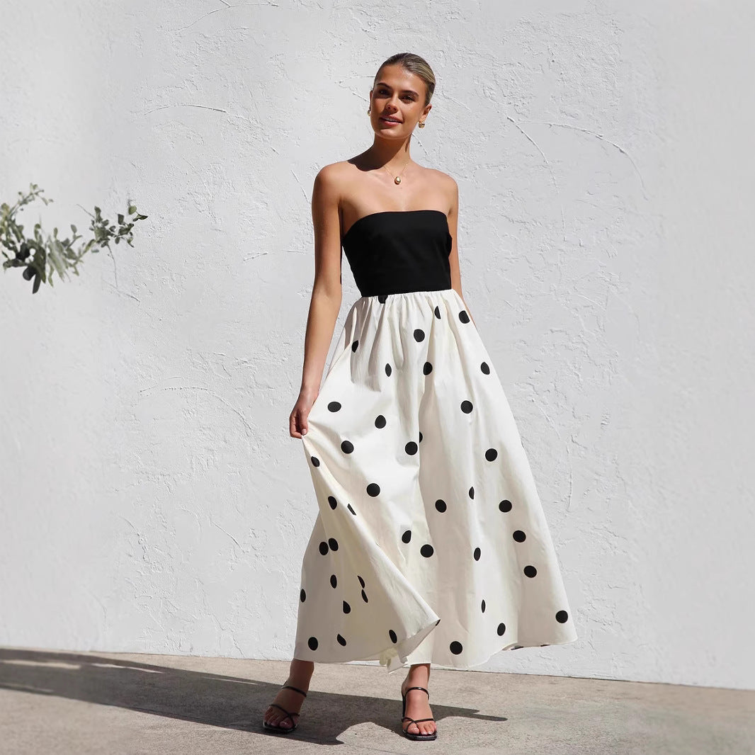 Chic women's strapless A-line maxi dress with polka dots, perfect for elegant summer parties or casual wear.