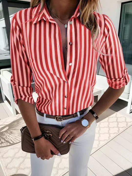 Fashionable women's striped summer blouse. Stylish, comfortable top perfect for chic casual outfits.