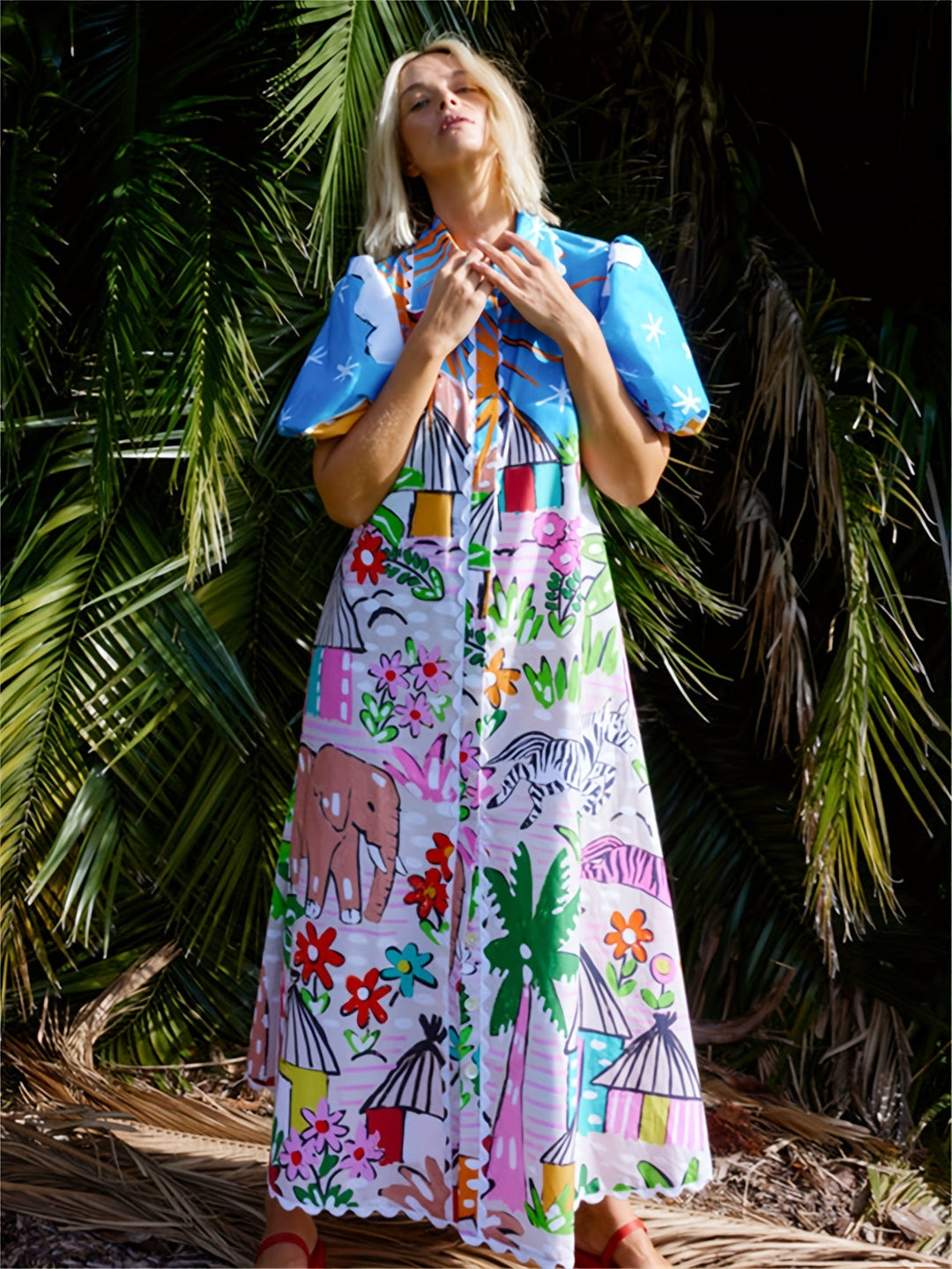 Flowy women's tropical print midi dress, perfect for stylish summer fashion & elegant occasion wear.