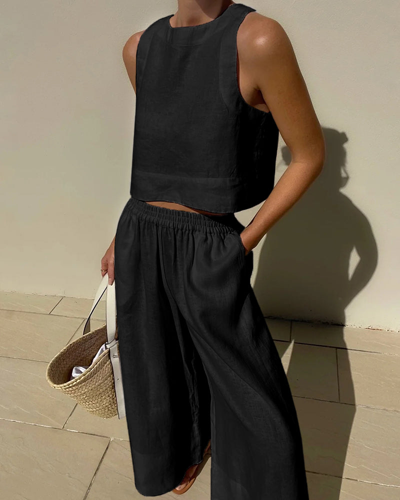 Effortless co-ord set: sleeveless crop top & elastic waist wide-leg pants for a comfortable summer outfit.