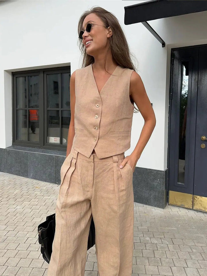 Women's waistcoat and wide-leg pant set, blending professional flair with comfortable smart casual.