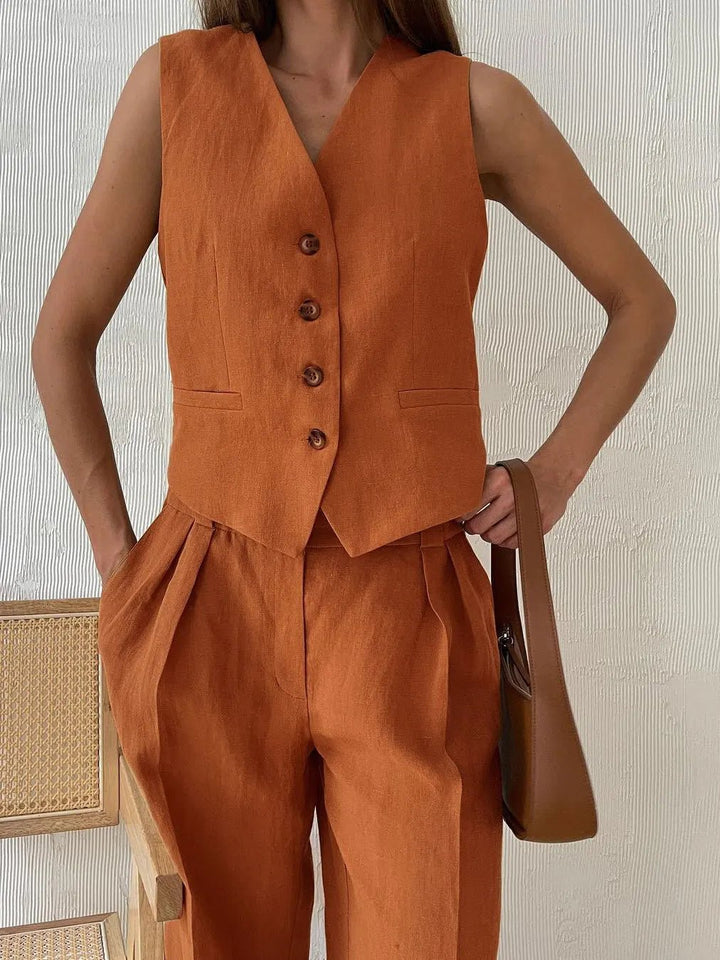 Elegant women's fashion ensemble: sleeveless waistcoat & wide-leg pants for a chic summer outfit.