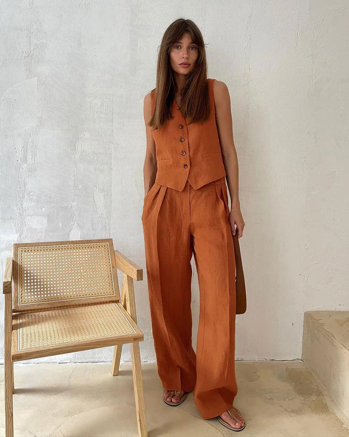 Modern tailored women's waistcoat and wide-leg trousers. A chic two-piece for sophisticated style.