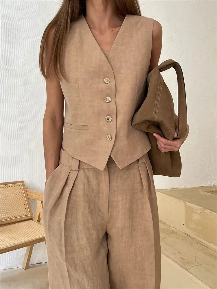 Stylish women's co-ord set: smart casual waistcoat and elegant wide-leg pants for any occasion.