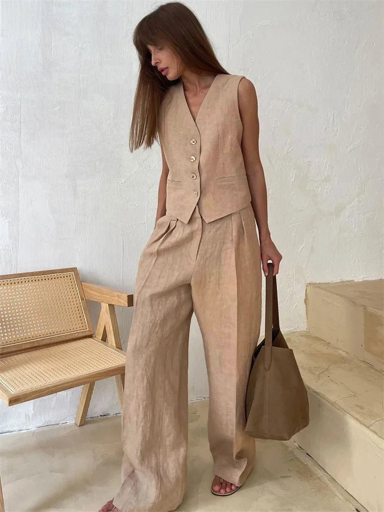 Sleek women's waistcoat and comfortable wide-leg trousers. A chic two-piece for modern fashion.