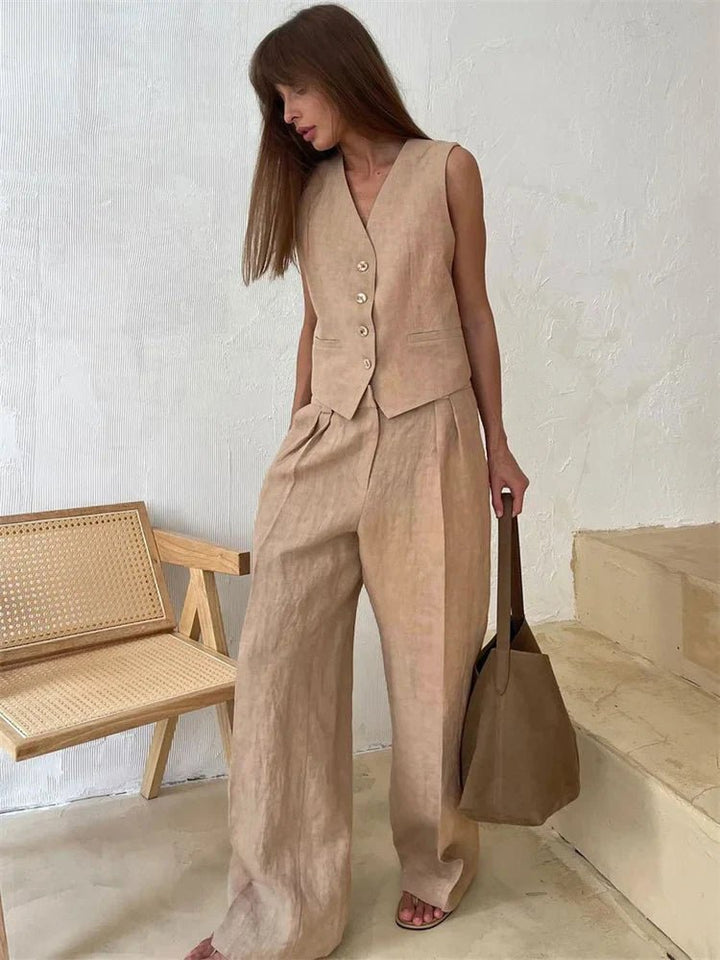 Sleek women's waistcoat and comfortable wide-leg trousers. A chic two-piece for modern fashion.