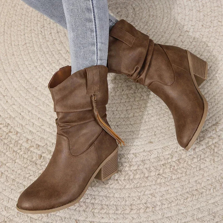 Effortless chic women's western boots with tassel detail and comfortable block heel for all-day wear.