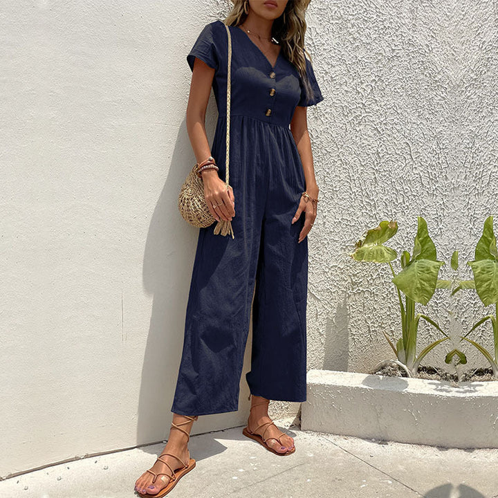 Stylish women's wide leg jumpsuit with an effortless design. Perfect for summer fashion, casual or dressed up.