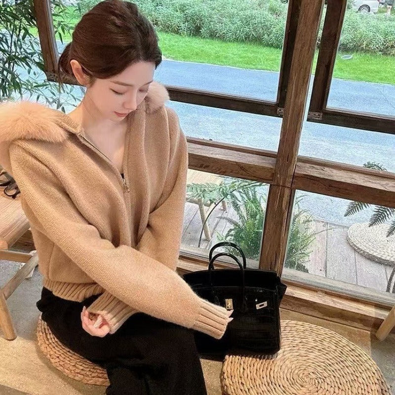 Warm & stylish women's winter jacket. Chic faux fur hood and elegant design for fashionable cold-weather wear.