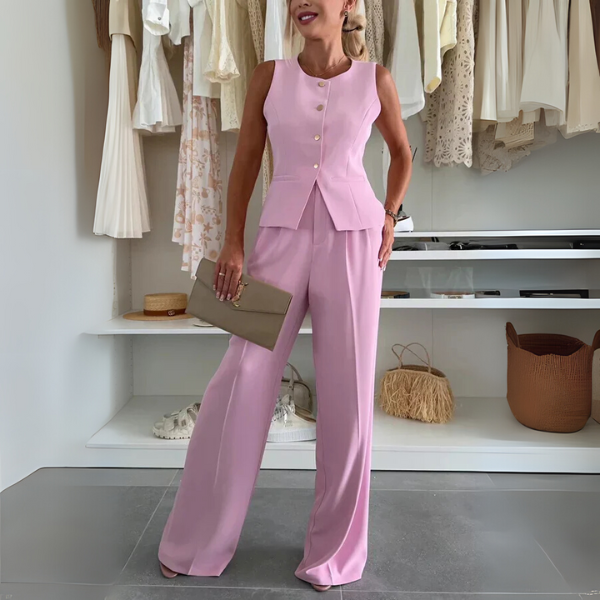 Breathable pink women's co-ord set. Stylish two-piece outfit for summer fashion and elegant casual wear.