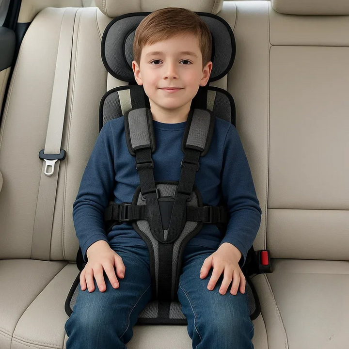 Easy-clean, compact foldable child travel seat with adjustable safety straps for hassle-free journeys.