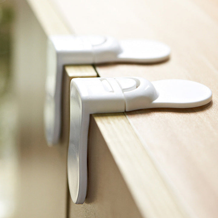 Toddler safety latch for kitchen cabinets & drawers. Child protection from curious little hands, home security.