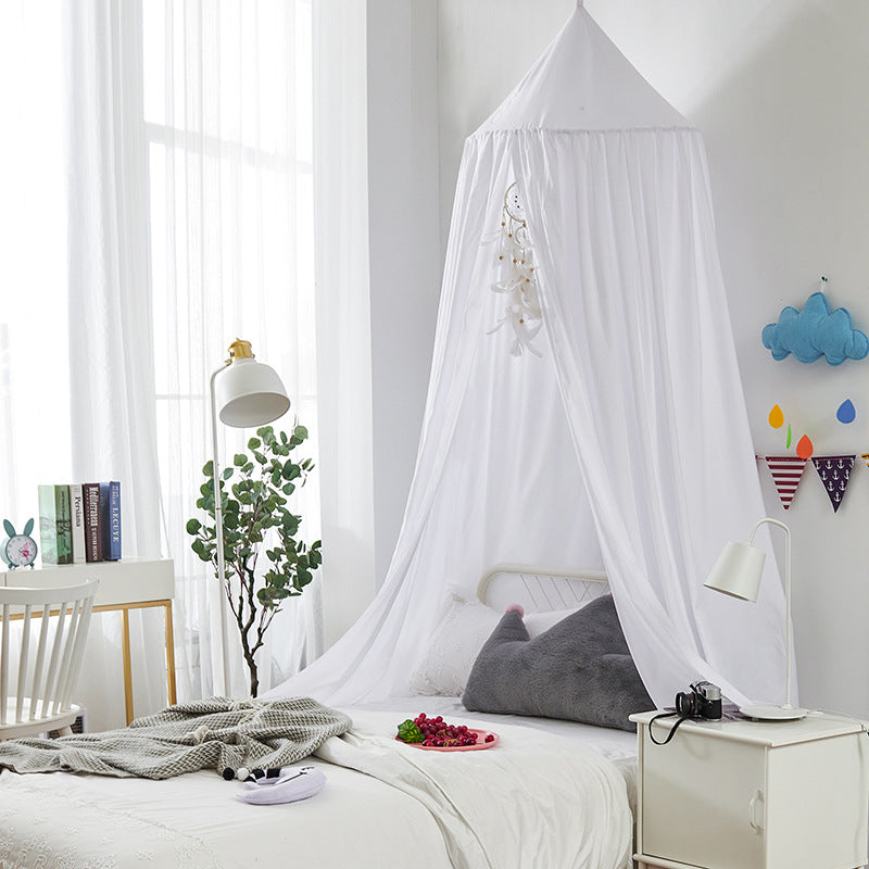 Polyester blackout bed canopy for children, a stylish and functional nursery decor item.