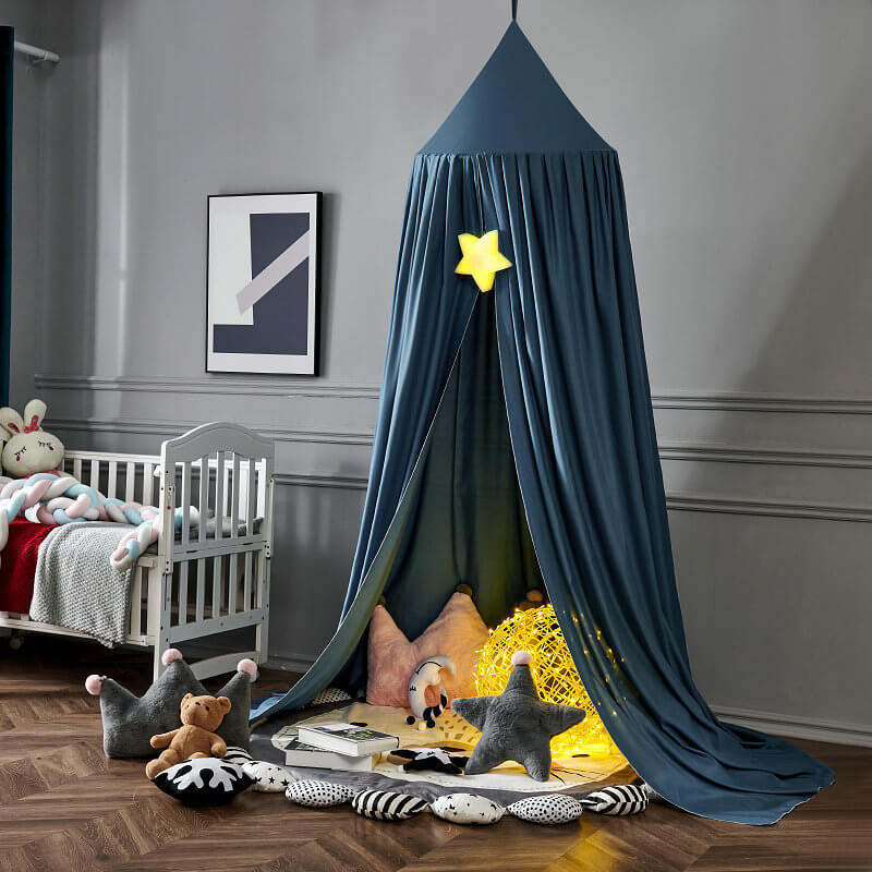 Whimsical blackout bed canopy for a child's bedroom, perfect for peaceful sleep & quiet play.