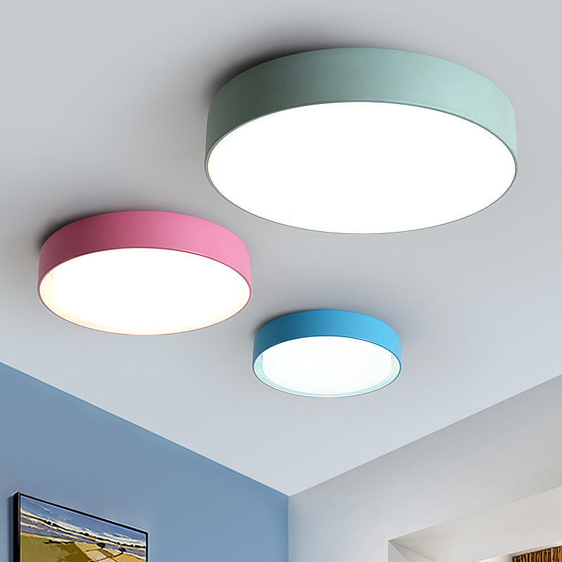 Children's colorful round dimmable LED ceiling light for kid's room or nursery, energy-efficient acrylic fixture.