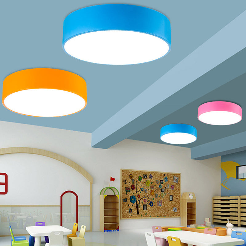 Dimmable colorful round acrylic LED ceiling light for children's room, energy-efficient and bright playroom lighting.