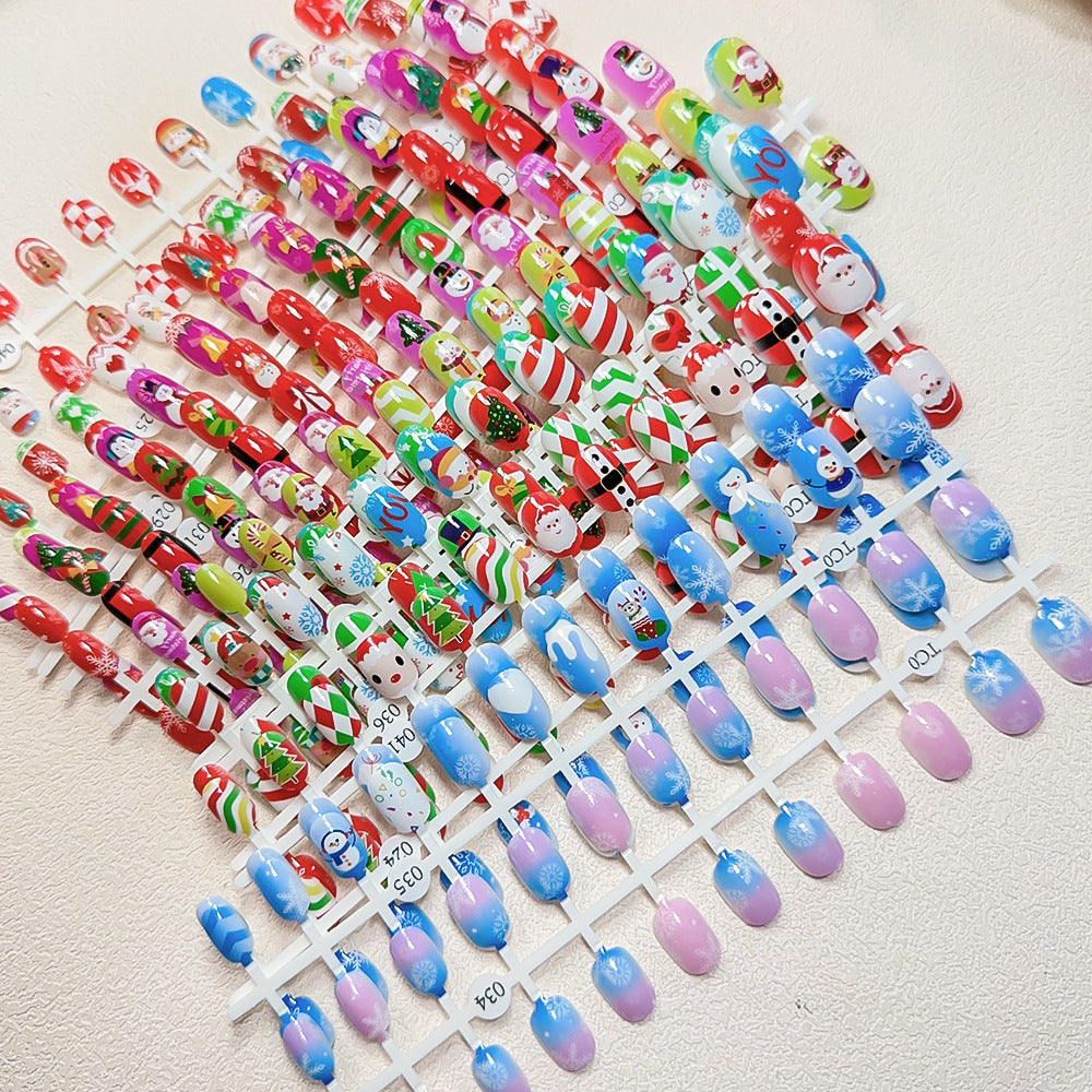Playful children's press-on nails, 24 fun festive designs, non-toxic & safe for girls.