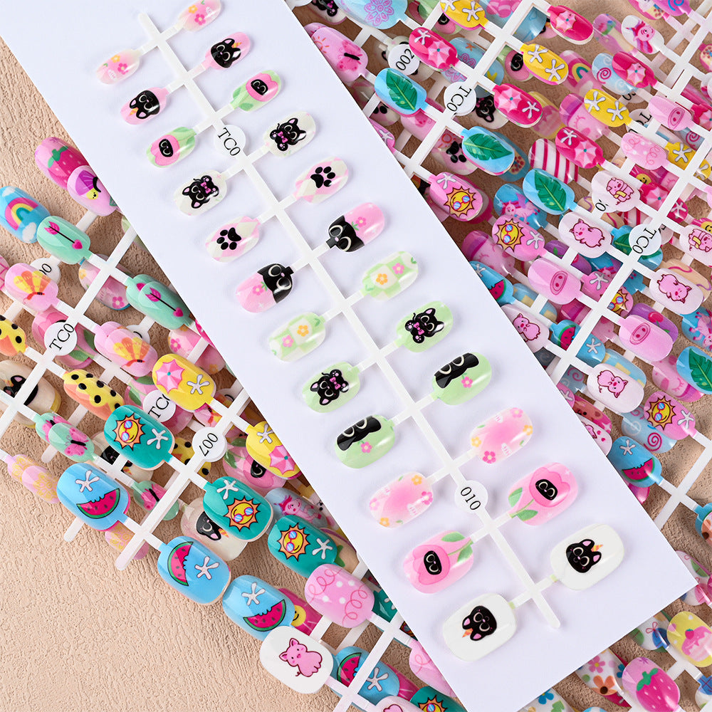 Girls' non-toxic press-on nails, safe & simple for imaginative nail art & playtime.