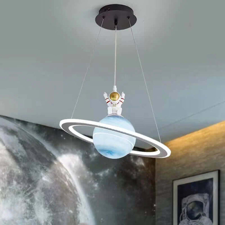 Artistic LED planet pendant light, bringing a magical celestial glow to any children's room.