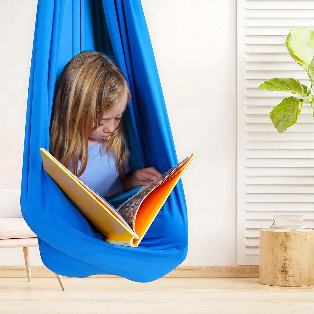 Children's sensory hammock swing for calming comfort & therapy, ideal for kids with autism/ADHD.