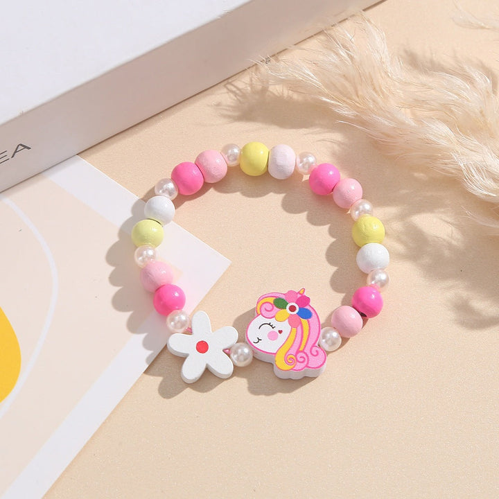 Children's unicorn and flower beaded bracelet, colorful wood beads for girls' playful jewelry.