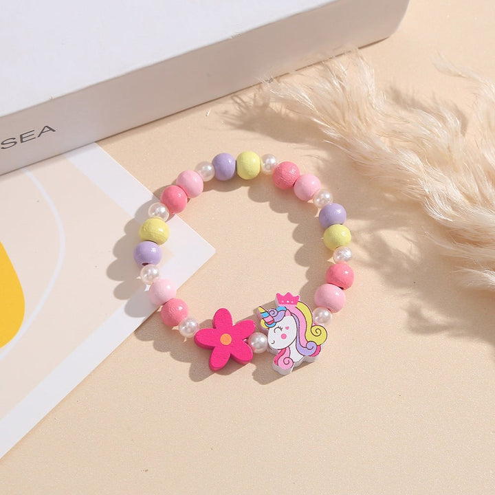 Girls' adjustable beaded bracelet, charming unicorn & flower details, comfortable wood beads.