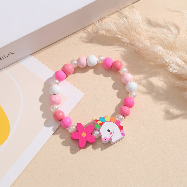 Playful children's jewelry: unicorn & flower wooden beaded bracelet for little girls.