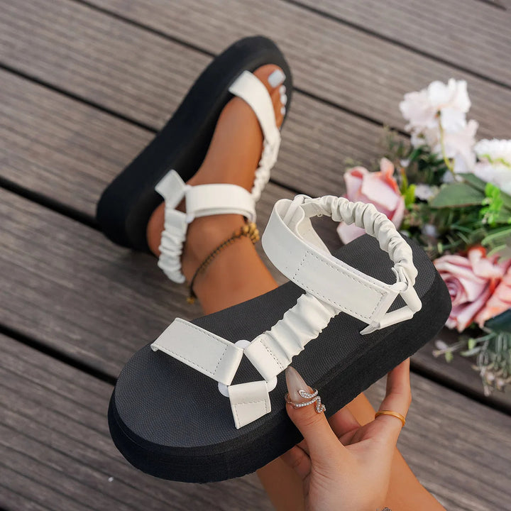 Iridescent platform sandals for women, a comfortable and stylish chunky summer footwear option.