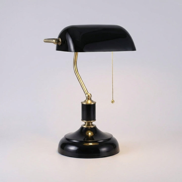 Polished brass base banker lamp with adjustable green glass shade. Classic vintage lighting for desk & office.