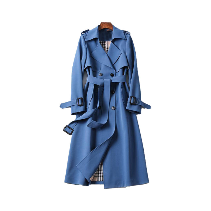 Timeless women's double-breasted trench coat. Belted, classic design for versatile fall and spring outerwear.