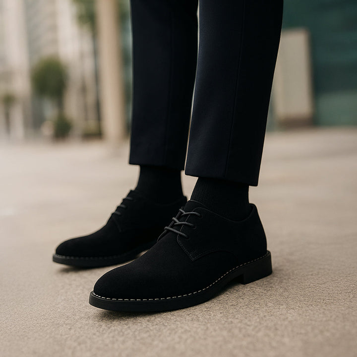 Lace-up men's black dress shoes for formal events, weddings, and sophisticated business wear.