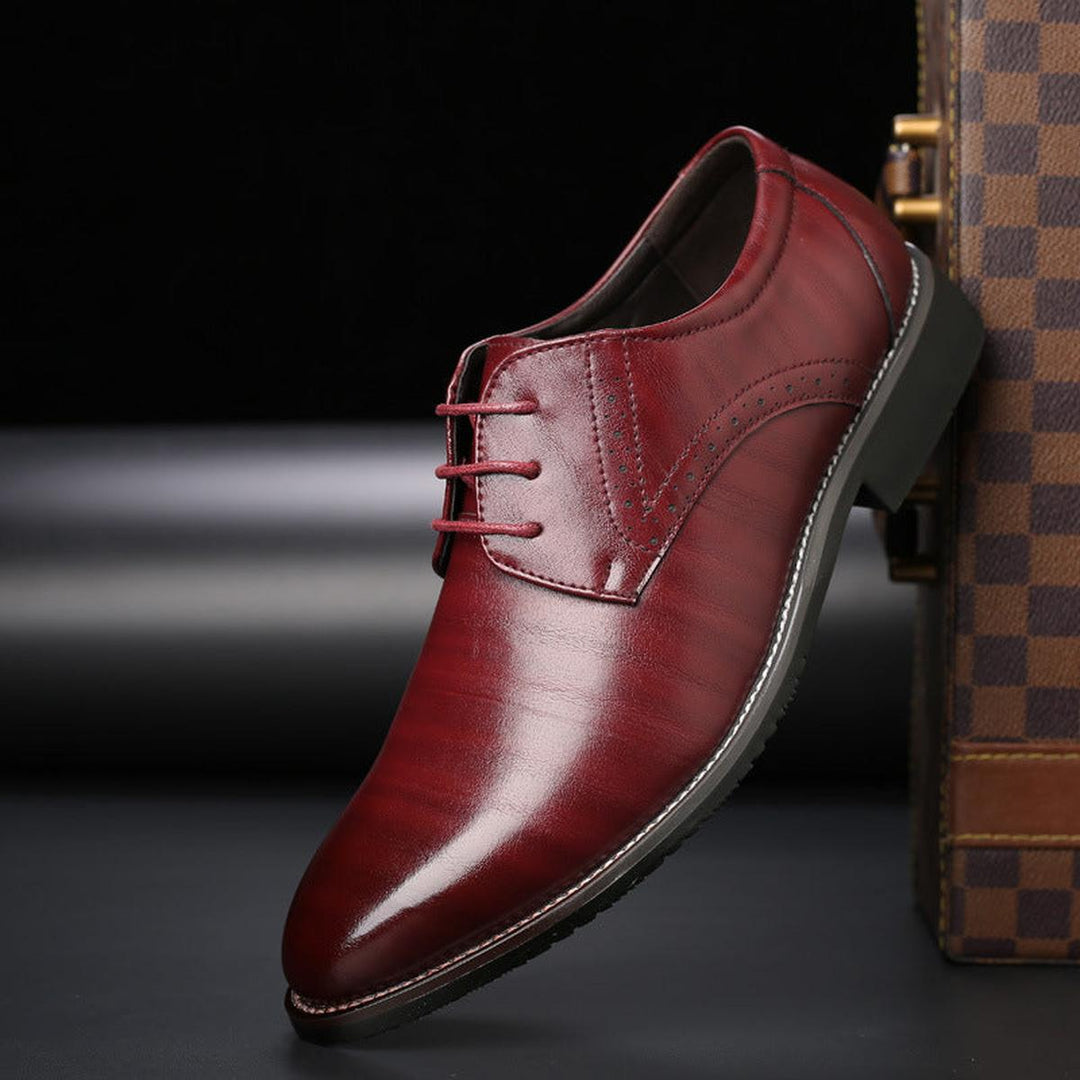 High-quality men's dress shoes, black leather lace-up style for sophisticated formal events.