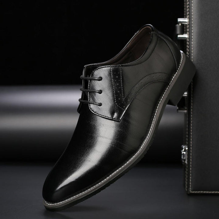 Timeless men's lace-up formal shoes, a classic choice for business, weddings & elegant attire.
