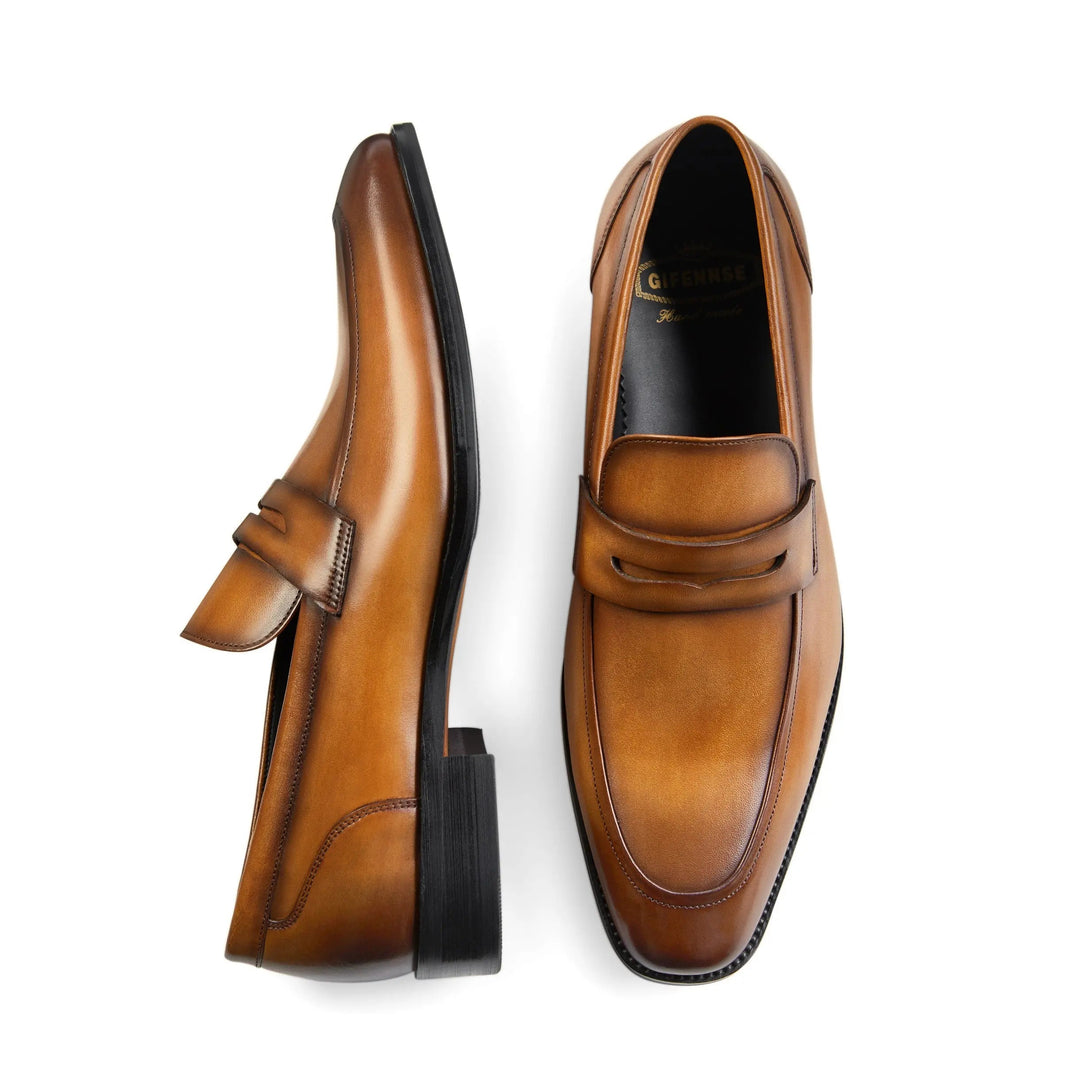 Mens comfortable slip-on penny loafers, timeless style, versatile for office or leisure.