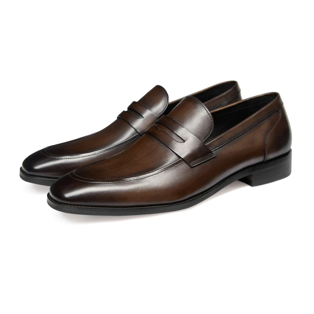 Durable leather slip-on penny loafers for men, versatile classic footwear for lasting style.