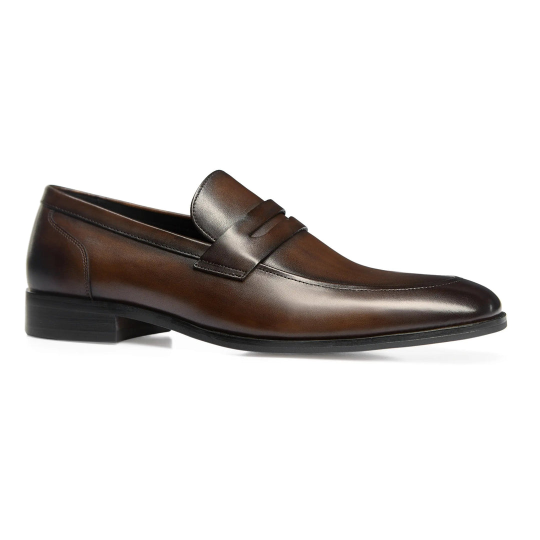 Fashion-forward men's brown slip-on penny loafers, comfortable, stylish, and versatile.