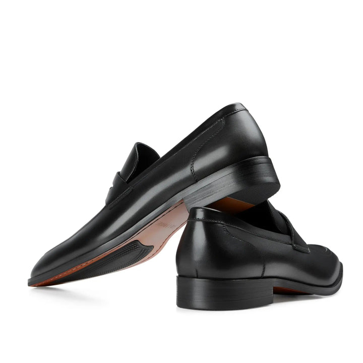 Timeless brown leather penny loafers, mens slip-on style, perfect for casual or business attire.
