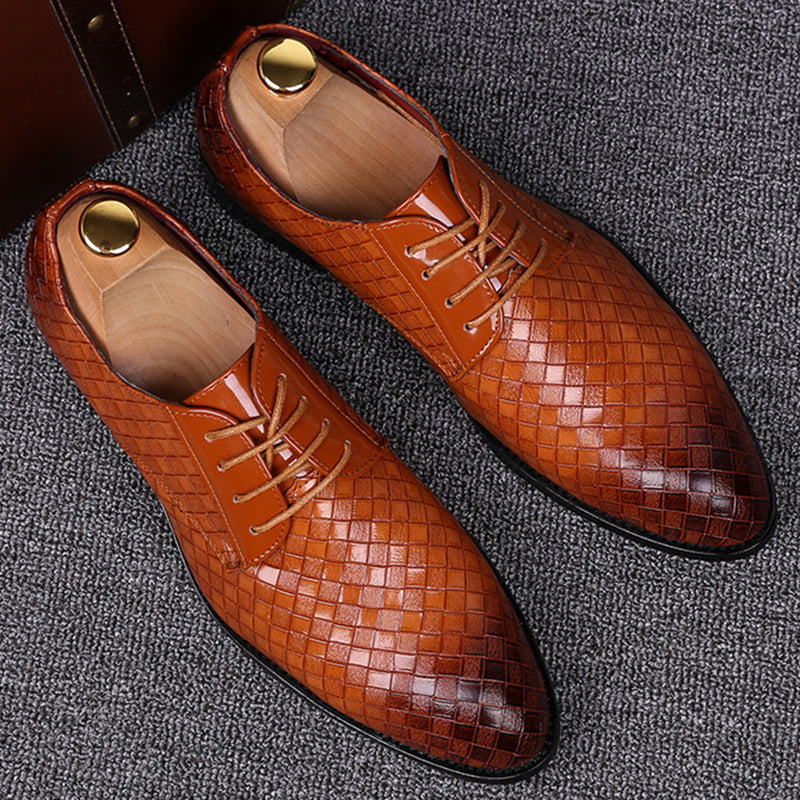 Classic black men's lace-up oxford dress shoes, perfect for formal events or business casual attire, featuring a polished finish.