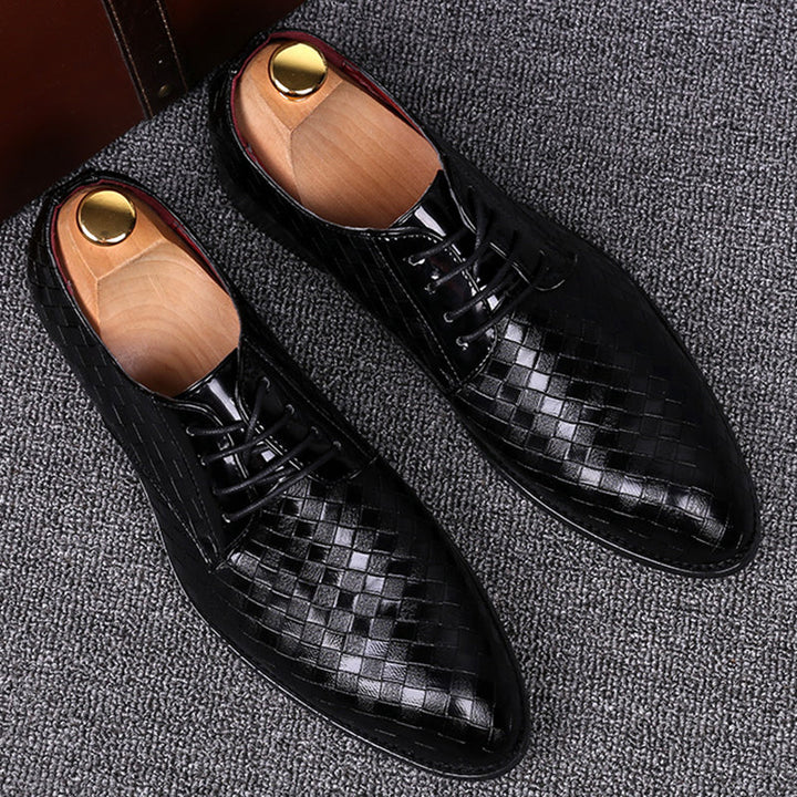 Stylish men's leather lace-up formal shoes, ideal for business meetings or evening wear, offering classic style and comfort.