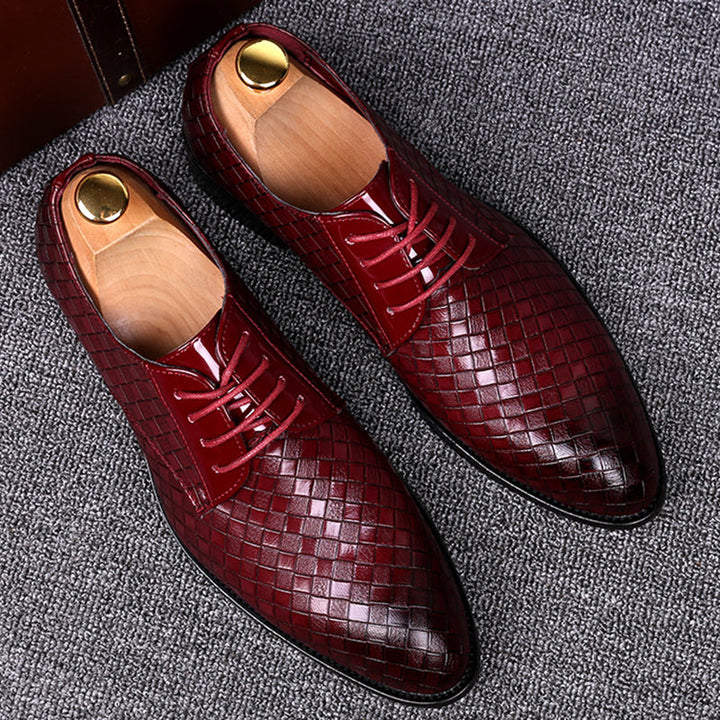 New men's classic lace-up dress shoes for a sharp look. Durable oxford style footwear, essential for modern men's fashion.