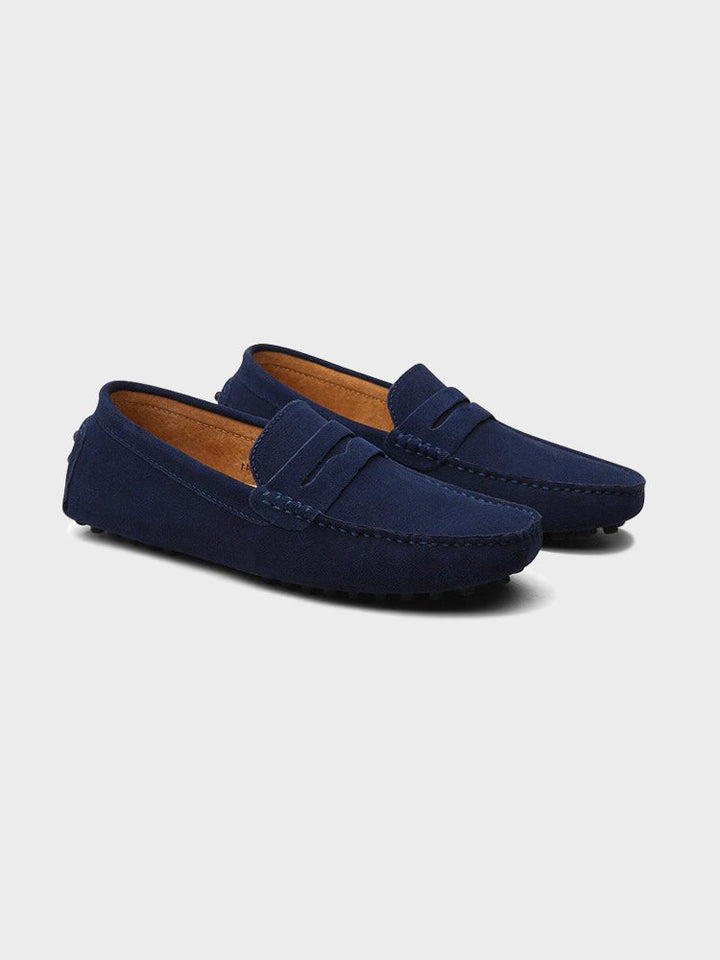 Comfortable brown men's penny loafers for smart style. Everyday wear slip-on dress shoes, perfect for the office.