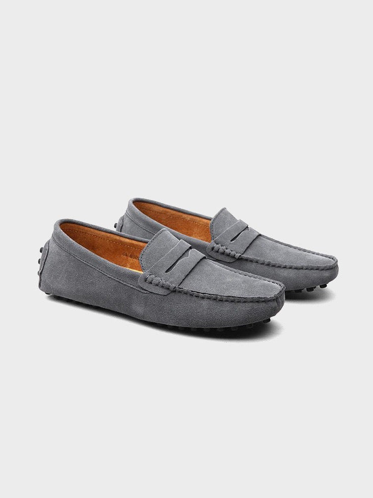 Elegant men's penny loafers for a refined look. Classic leather slip-on shoes for sophisticated men's fashion.