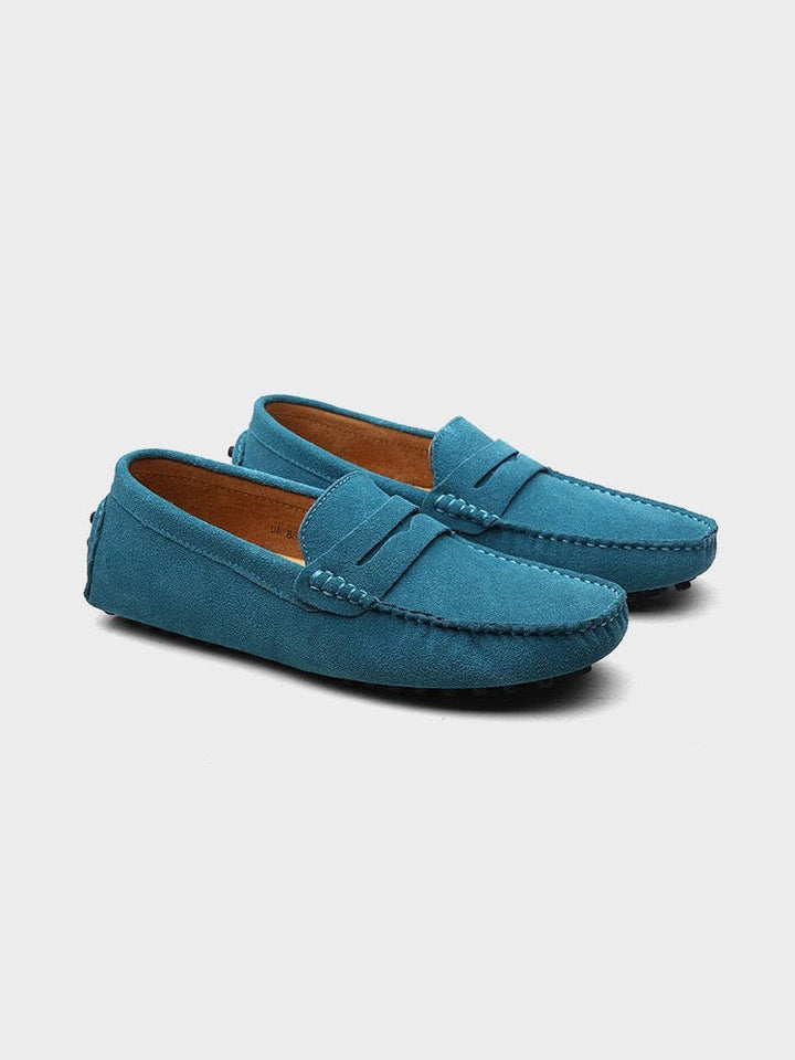 Versatile men's leather penny loafers, perfect for smart casual, office, or formal attire. Easy slip-on design.