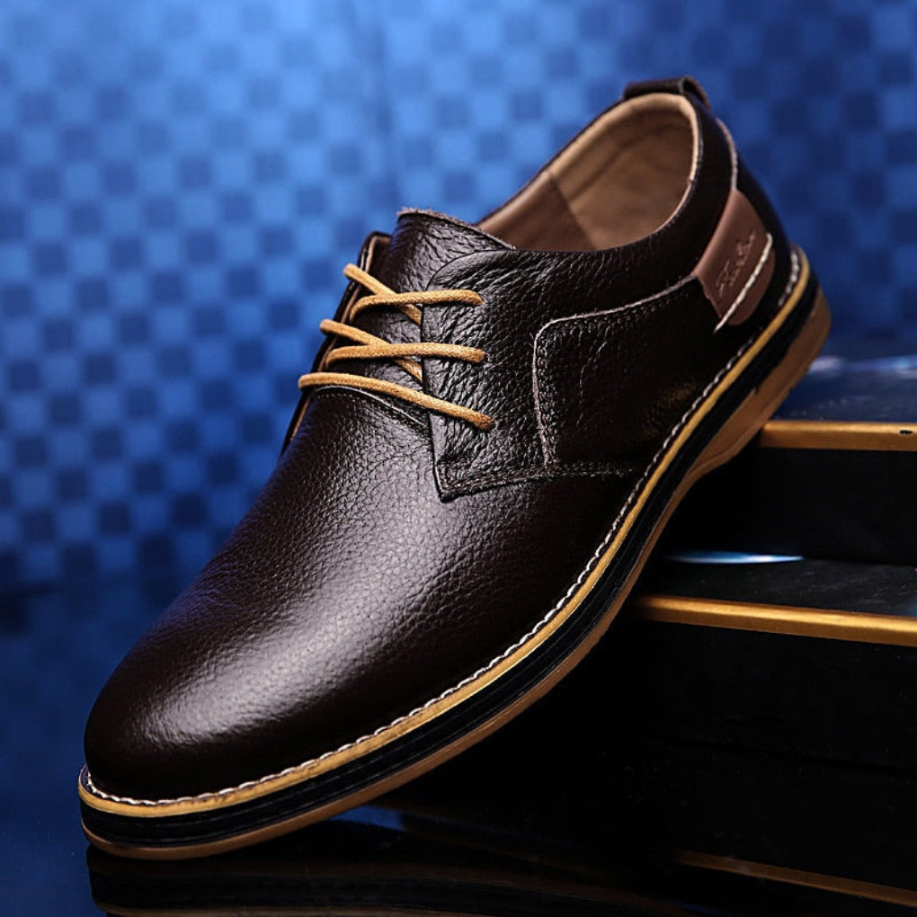 Stylish brown leather men's lace-up Oxford shoes, blending formal elegance with comfortable casual footwear for men.