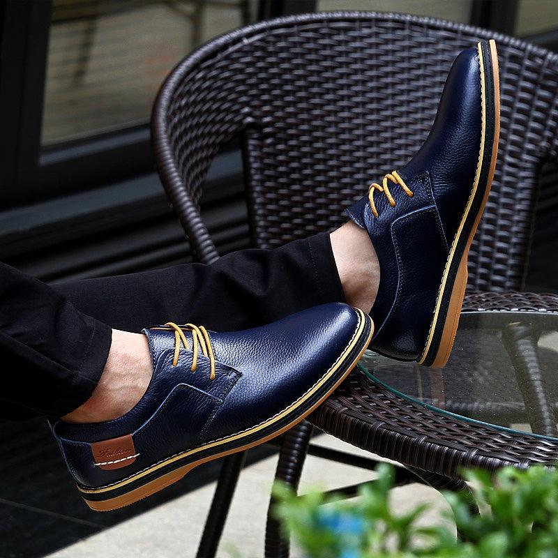Classic black men's oxford dress shoes, ideal formal footwear for business events, weddings, and office wear.