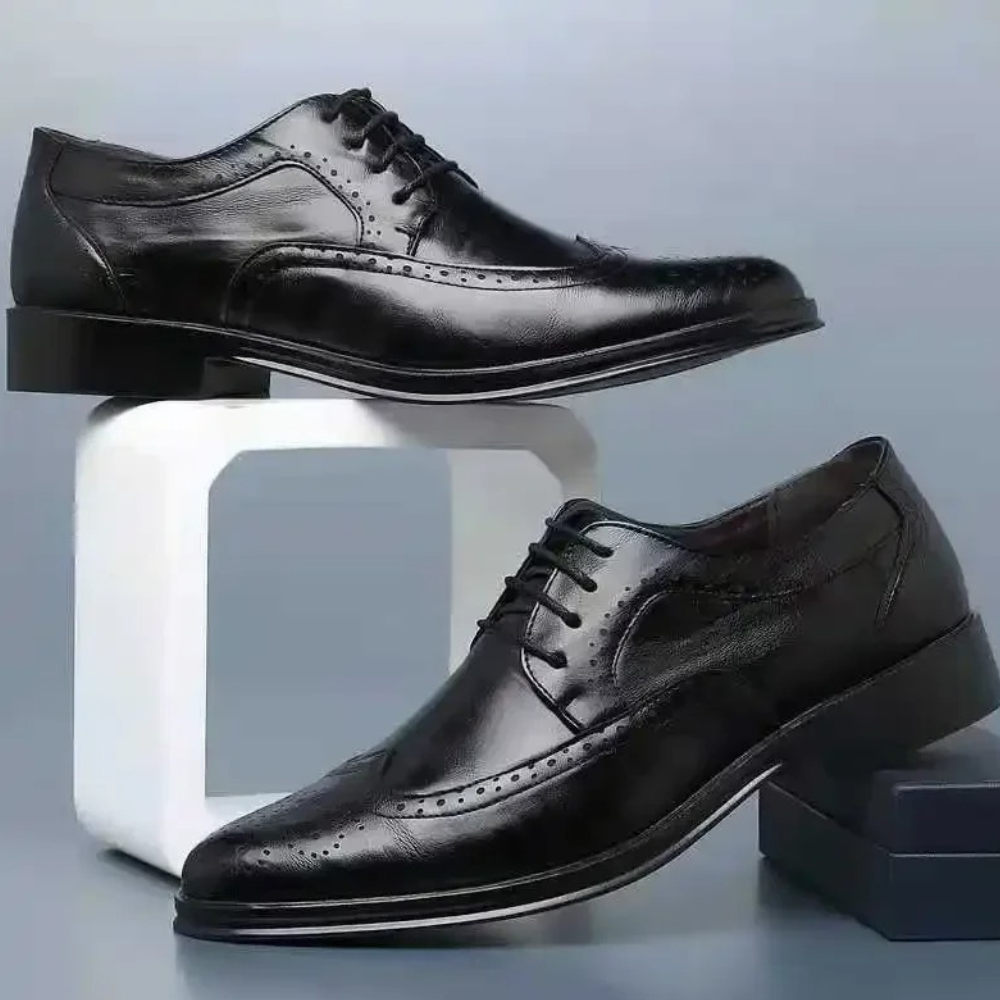 Classic black men's Oxford dress shoes, perfect for formal events, business, or elegant evening wear.