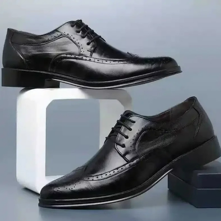 Classic black men's Oxford dress shoes, perfect for formal events, business, or elegant evening wear.