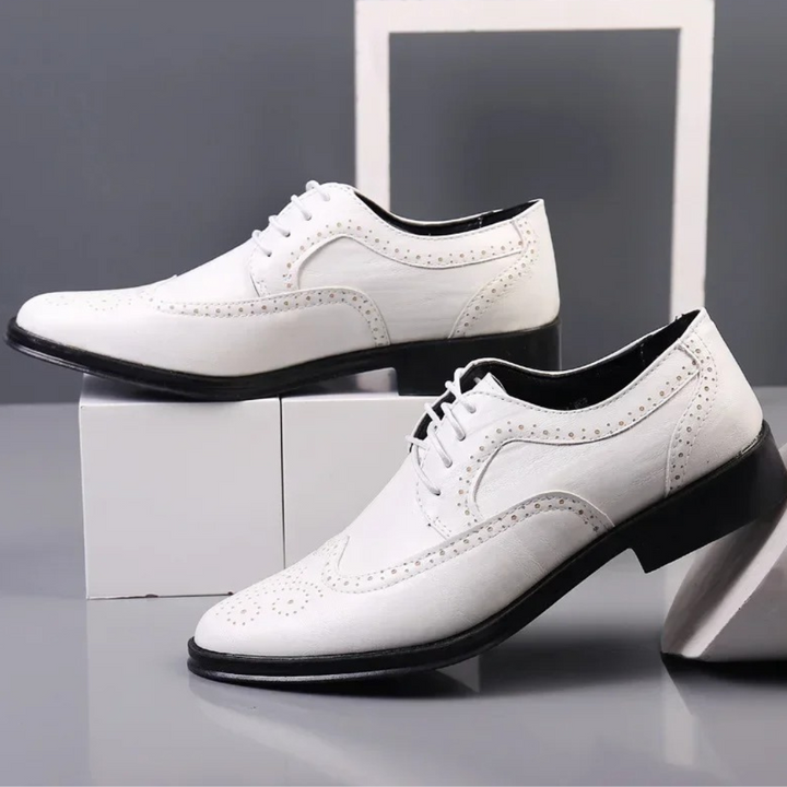 Polished black men's Oxford dress shoes, offering a timeless and refined look for any formal or special occasion.