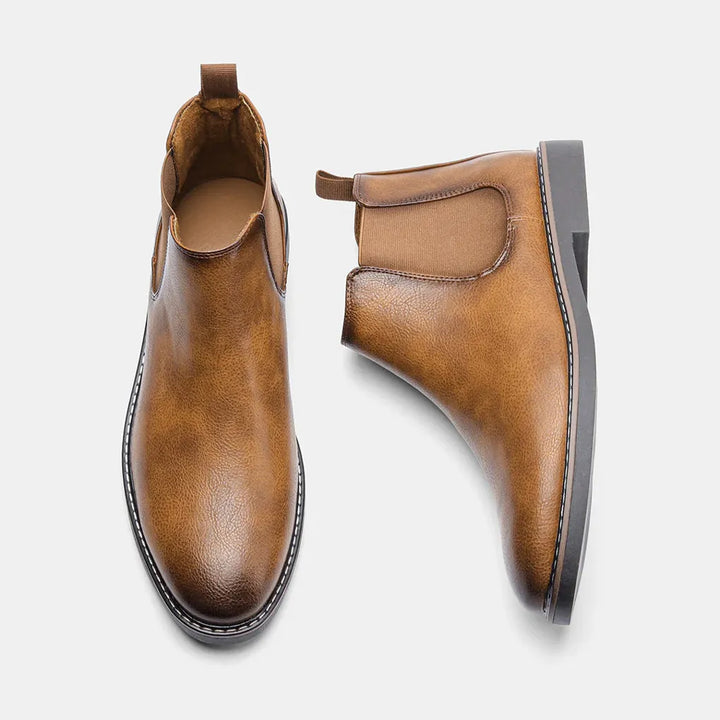 Elegant men's Chelsea boots, dark brown, versatile for professional or casual fashion.